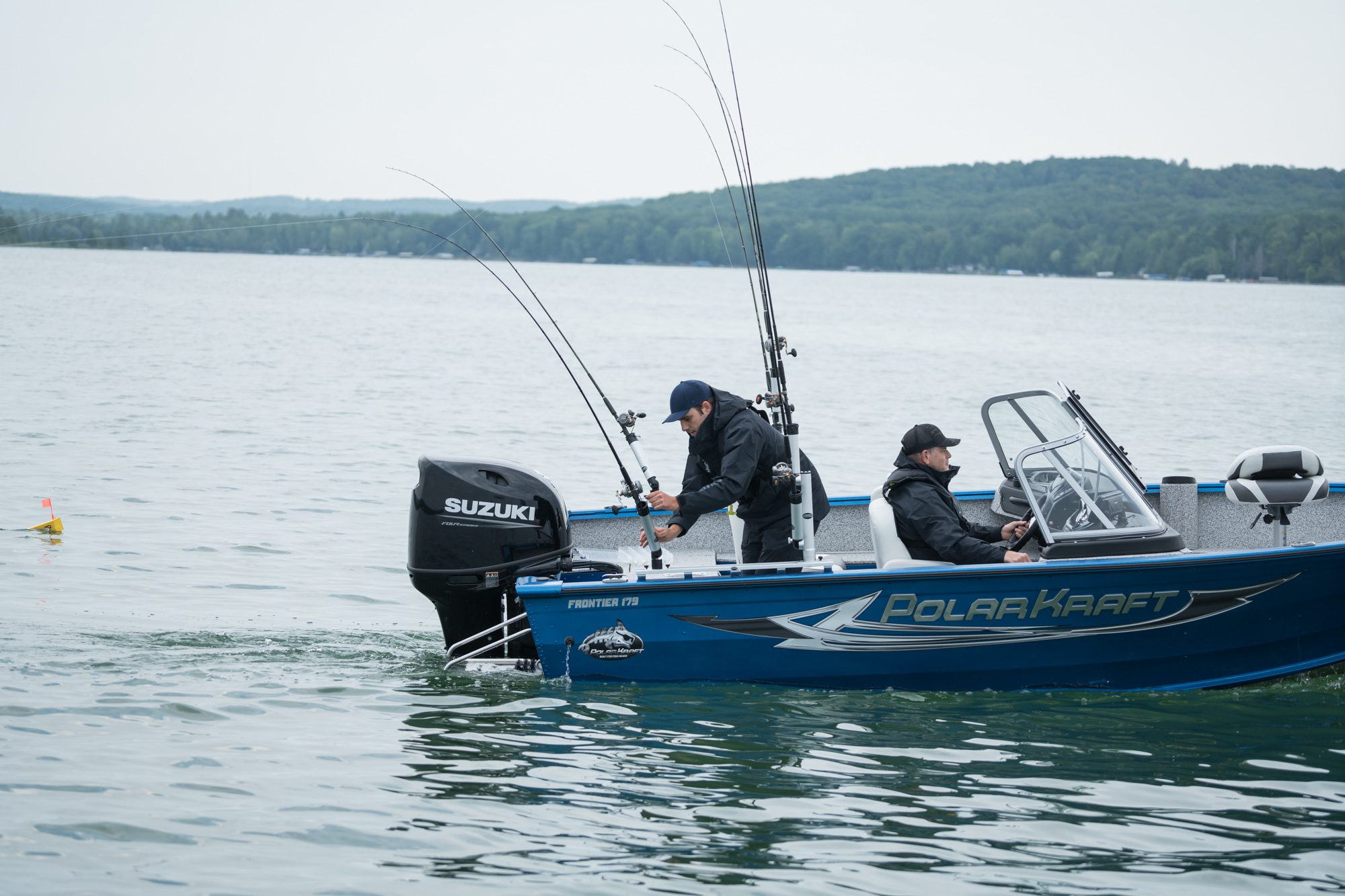 Anglers trolling from a Suzuki powered PolarKraft fishing boat