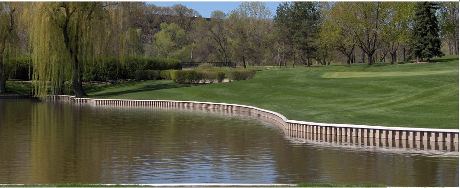 Curved vinyl seawall, golf course pond